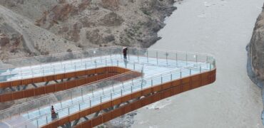 Cantilevered glass and steel walkway over a canyon in Tibet