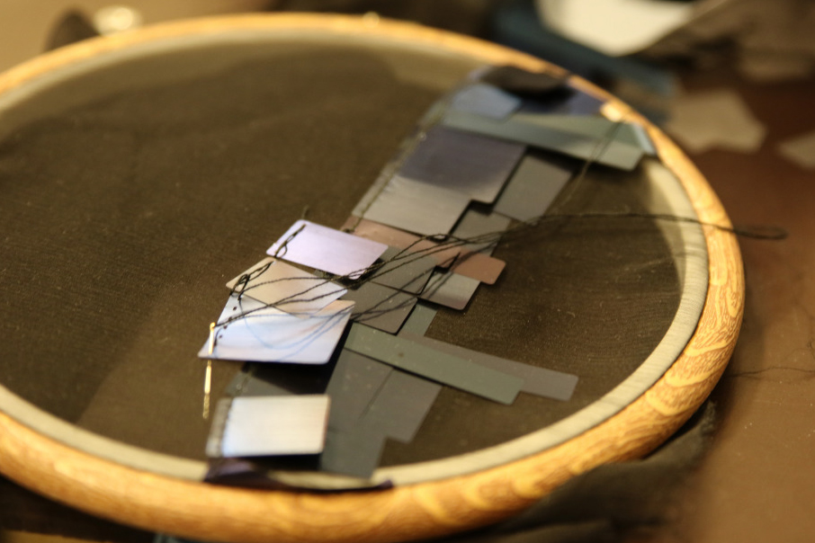All 6,000 razor-thin sequins are hand-sewn. All 6,000 razor-thin sequins are hand-sewn.