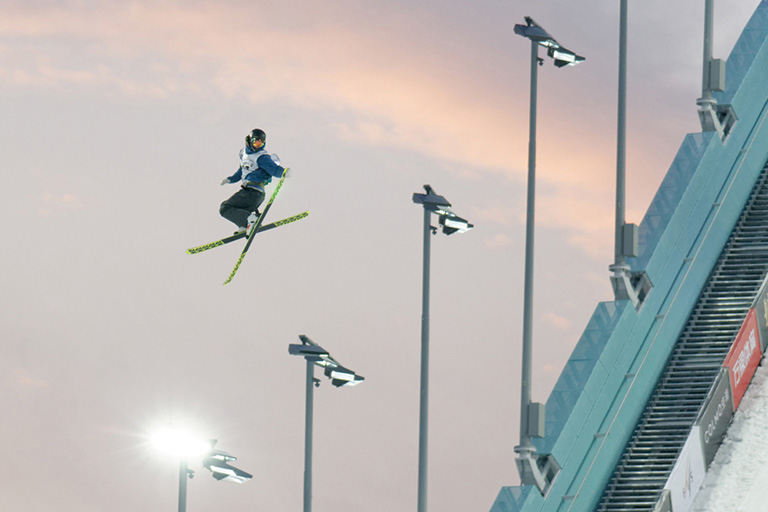A freestyle skier jumping at Shougang Big Air
