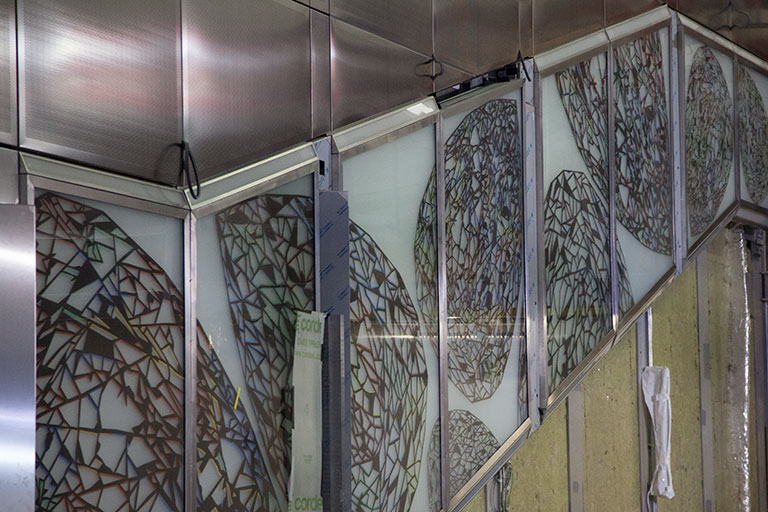 The glass and stainless steel panels used at Farrington Station feature a diamond design, reflecting the jewelry industry in the nearby Hayden Gardens. The glass and stainless steel panels used at Farrington Station feature a diamond design, reflecting the jewelry industry in the nearby Hayden Gardens.