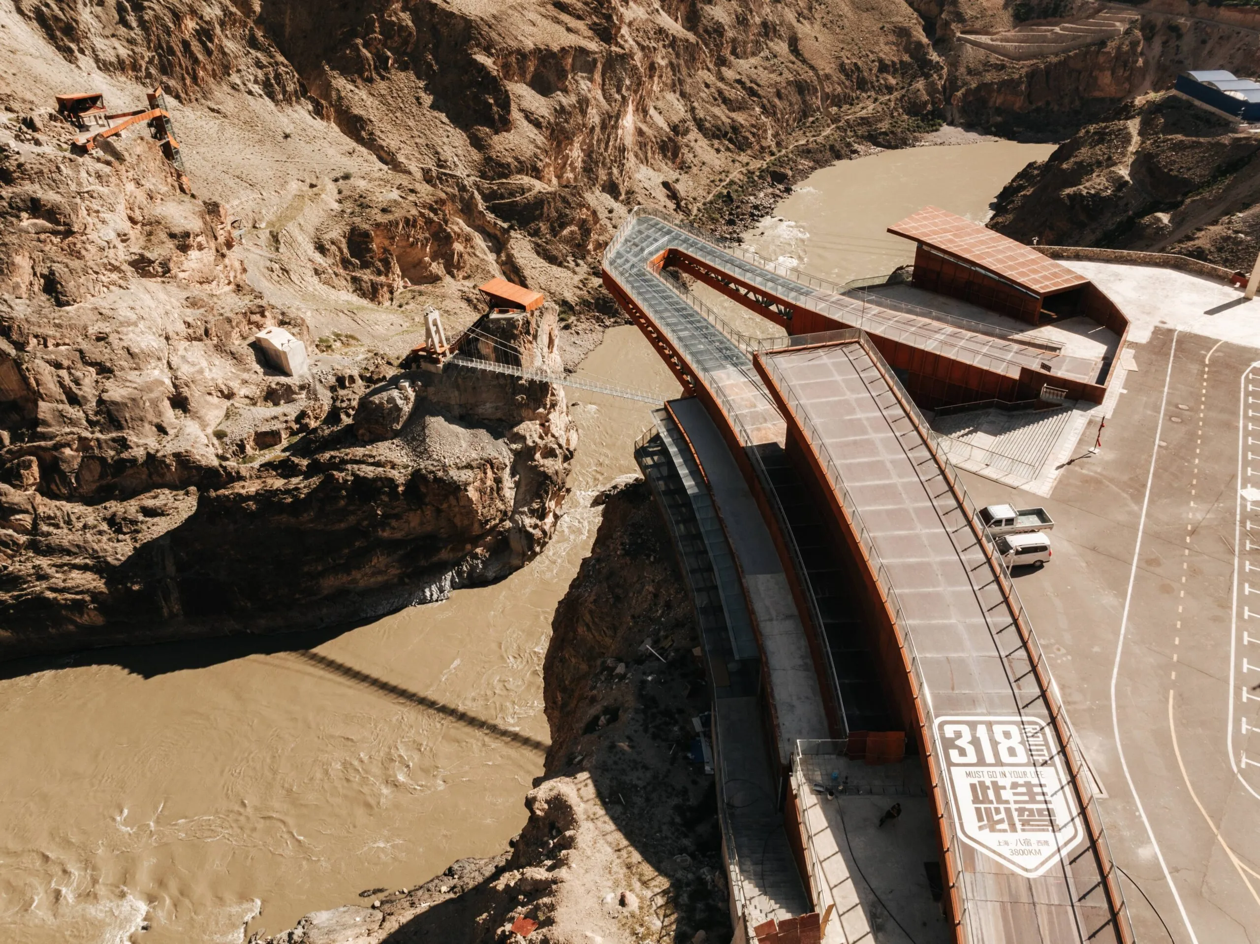 Image for %sExtreme conditions are overcome to suspend this steel walkway above a canyon in Tibet