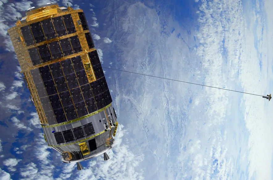 An illustration of a tether extending from JAXA's Kounotori transfer vehicle An illustration of a tether extending from JAXA's Kounotori transfer vehicle